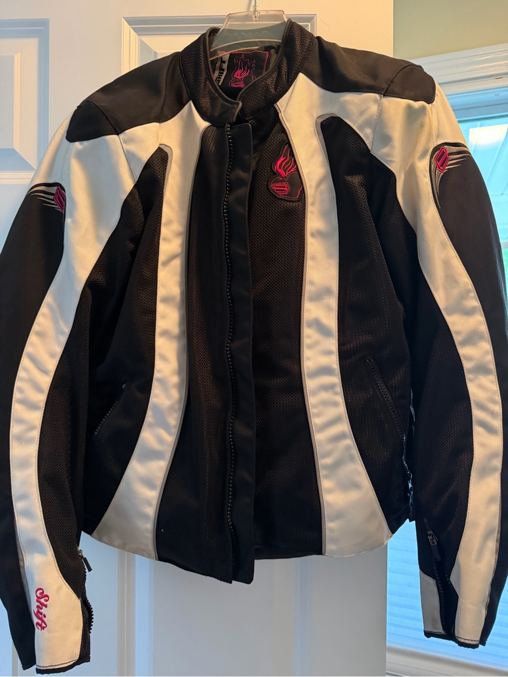 Women's Black and White Performance Motorcycle Jacket with Pink Accents
